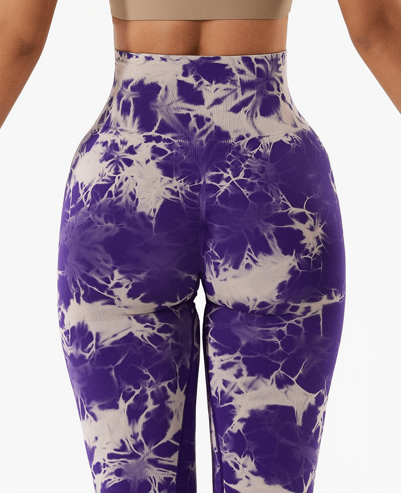Back view of purple tie-dye seamless elastic women's high waist leggings, perfect for fitness and yoga.